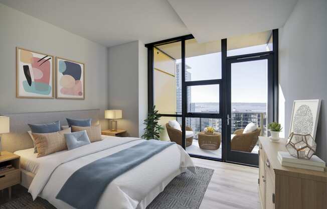 a bedroom with a large bed and a balcony