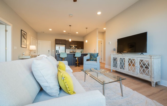 a living room with a couch and a table