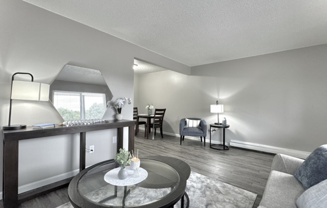 An inviting living room with a natural transition into the dining space.