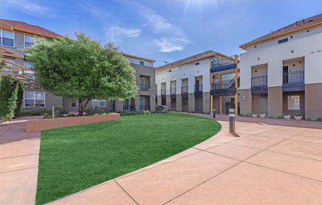 a large lawn in front of a building