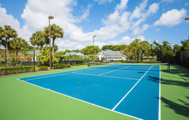 Tennis court at The Villages Apartment of Banyan Grove Apartments in Boynton Beach FL