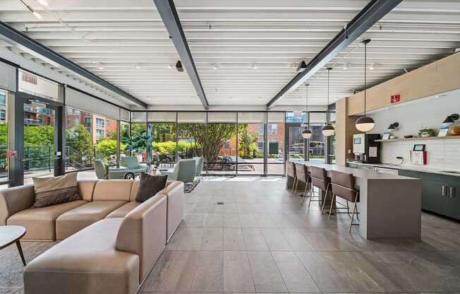 A modern outdoor seating area with a view of the city.