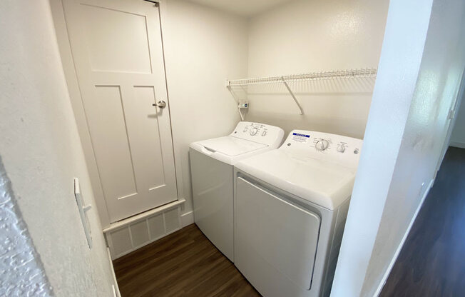 Two Bedroom First Floor Laundry Room at Byron Lakes Apartments in Byron Center, MI