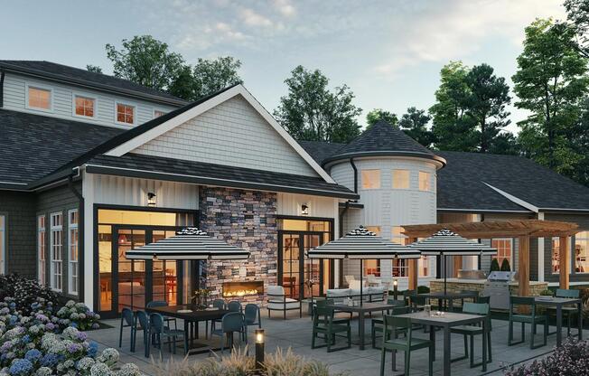 Dine al fresco at Modera South South with spacious tables, grills, and a fireplace for cozy outdoor evenings.