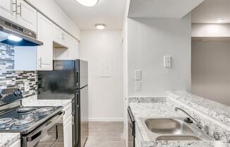 Granite Countertop Kitchen at The Hub at 934 Apartments, Atlanta, GA