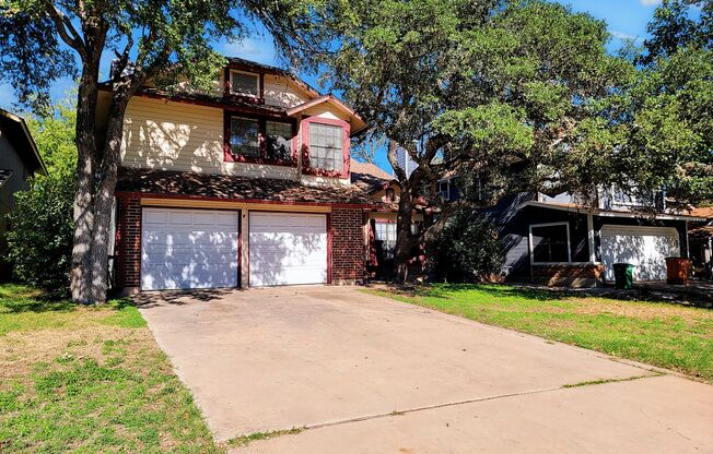 Warm & Inviting 4BR / 2.5BA Home with Covered Deck and 2-Car Garage