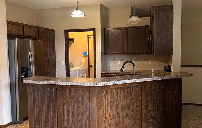 BEAUTIFUL 4 bedroom - 3 bathroom home with outdoor kitchen in Haysville!
