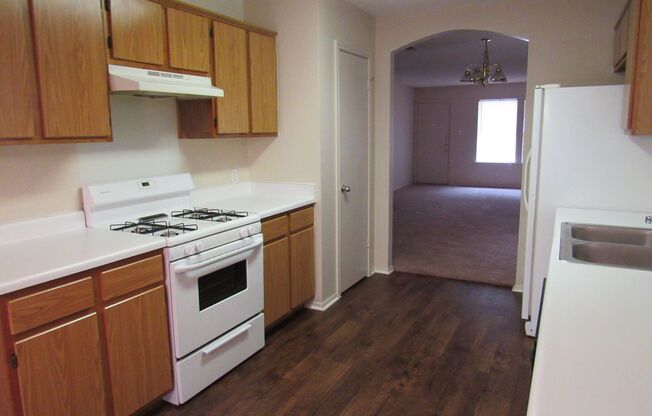 Cozy 3/2/2 one story with fence yard just west of I-35!