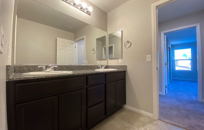 4 BED 2.5 BATH 2 CAR GARAGE,  LARGE CORNER LOT, GATED COMMUNITY IN NORTH VEGAS.