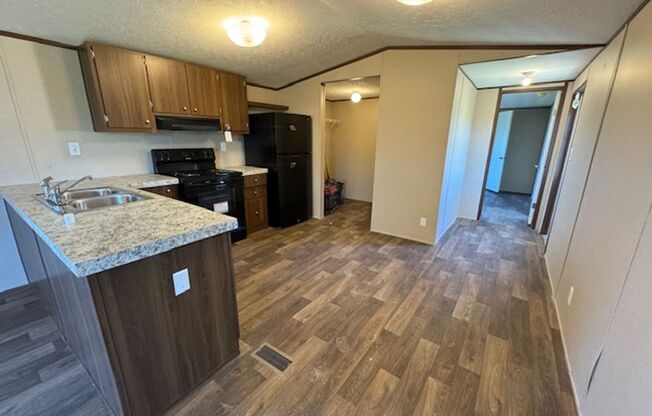 Move in June 10th 2025!! Beautiful 3 bedroom 2 bath w/Over 1/2 an acre