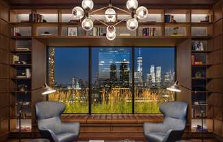 a living room with a view of the city at The Lively, New Jersey, 07302