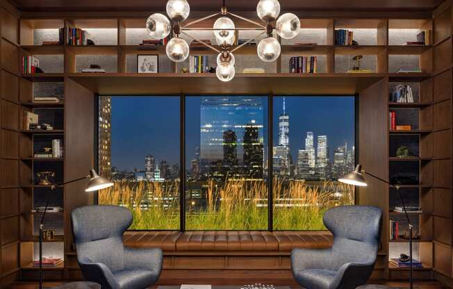 a living room with a view of the city at The Lively, New Jersey, 07302