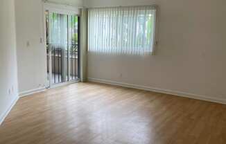 Living Room with Hardwood Floors and Patio Doors