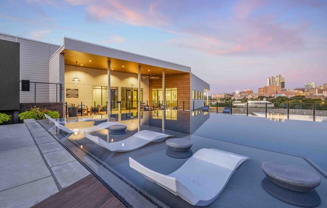 the home has a rooftop pool with views of the city