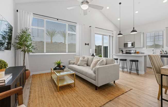 a living room with a couch and a table