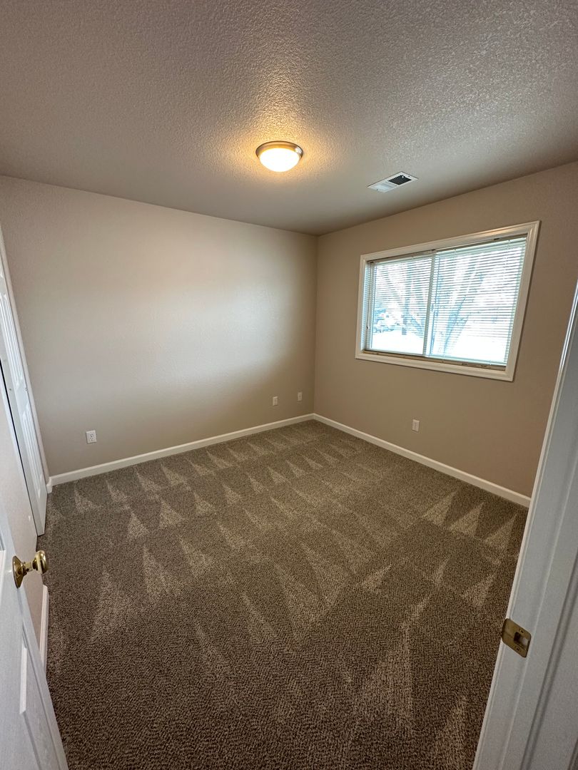 2 BEDROOM, PLUS OFFICE SPACE, 2 BATHROOM, SINGLE LEVEL TOWNHOME WITH 2 CAR ATTACHED GARAGE