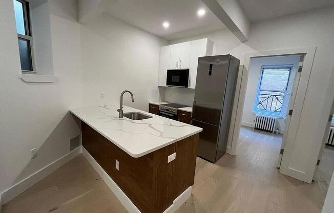 66 E 7 ST