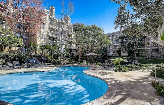 Available for Immediate Move In!! Beautiful Views and Lush Landscape surround this Huntington Beach Condo.