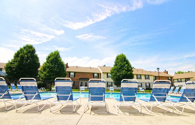 Outdoor Swimming Pool with Seating at Chelsea Village Apartments
