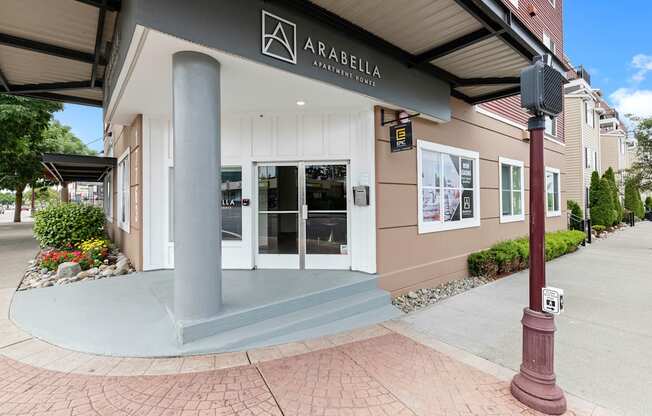 View of the property entrance with Property Signage at Arabella Apartment Homes, Shoreline, WA
