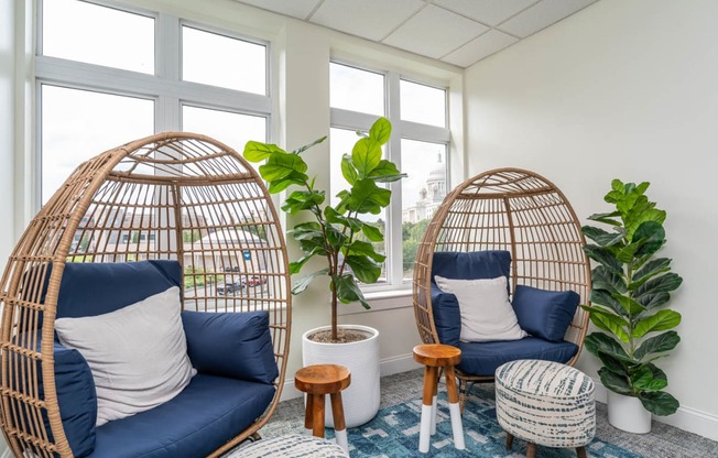 a room filled with furniture and a large window