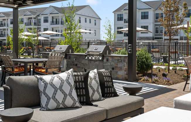 a patio with couches and tables and a pergola at Madison Prickett Preserve, Yardley Pennsylvania