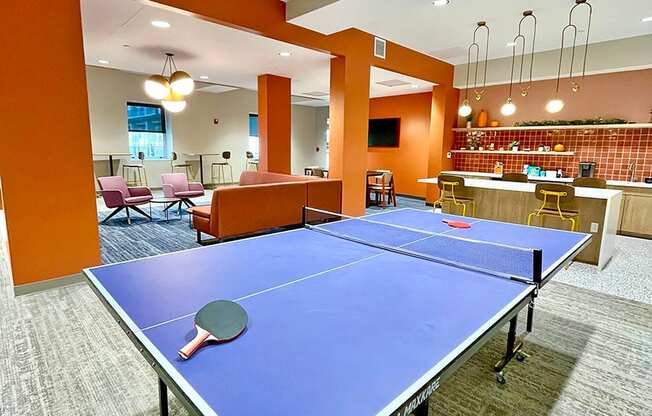 clubroom/resident lounge with ping pong table at The Residences at Delmar DivINe, St Louis, MO