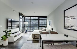 River-View 2BD Luxury Condo with Balcony and Parking!
