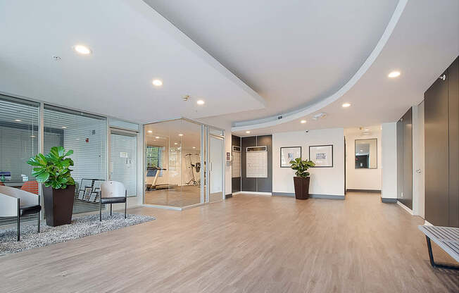 A spacious office with wood floors and a curved ceiling.at Plaza Lafayette, Los Angeles, CA  