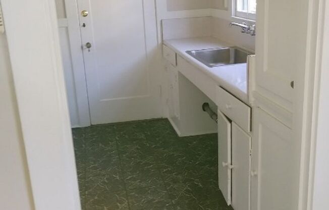 Unit has newer appliances and flooring in bathroom