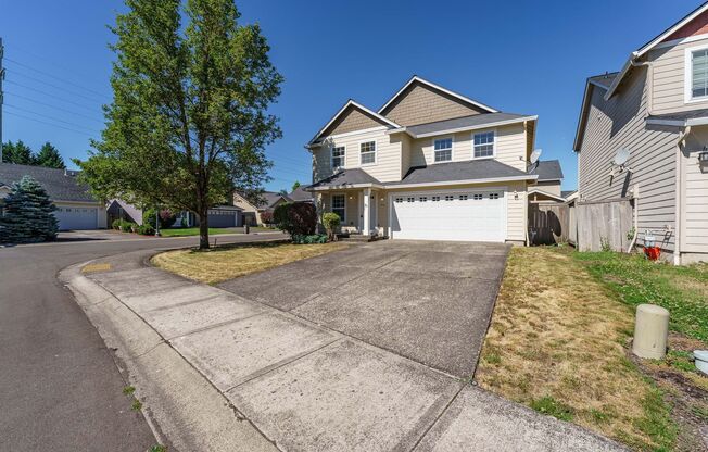 Your Next Home Awaits! 4BR/2.5BA with Fenced Yard & Garage