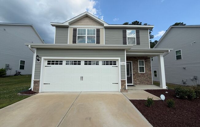 Modern 3BD, 2.5BA Raleigh Home in a Great Location with a Covered Patio and Private Backyard