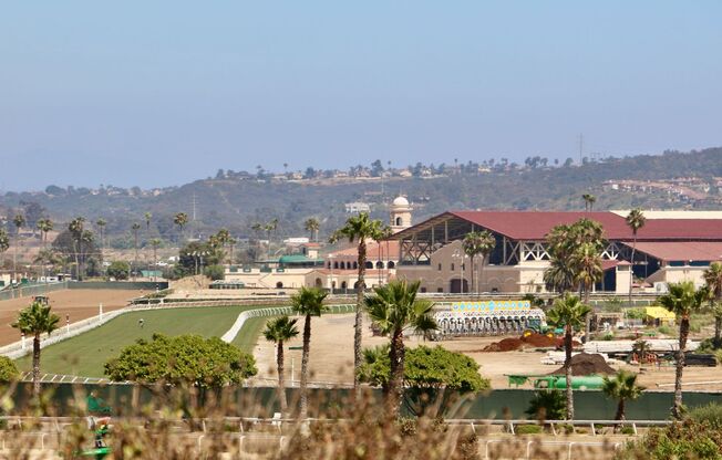 SURFER’S BEACH FLAT w/ IN UNIT LAUNDRY ! ..... tandem GARAGE !!!