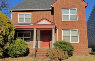 Large single family residence in Wallace Manor on corner lot.