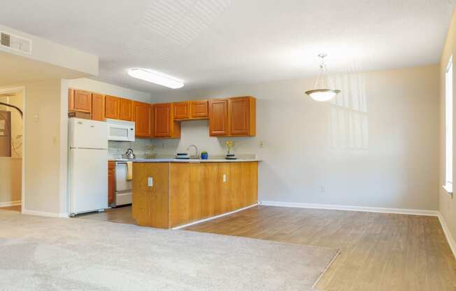 a kitchen and living room in a 555 waverly unit