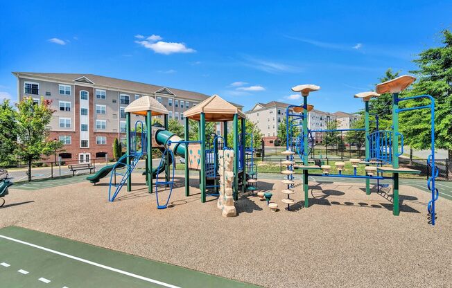 playground with play equipment and buildings