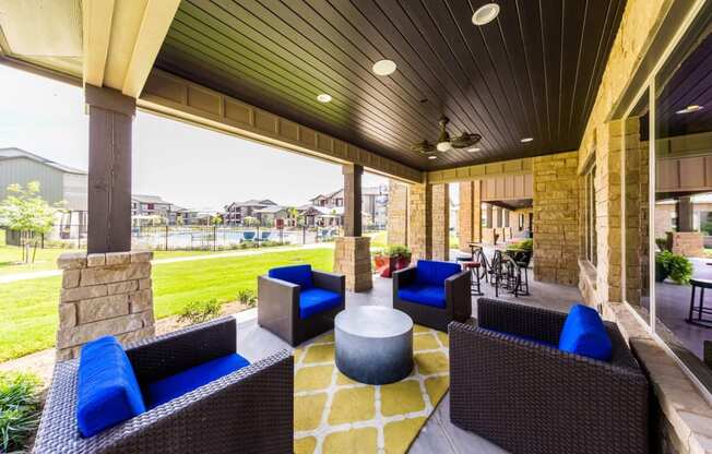 Clubhouse Outdoor Seating Area Overlooking Pool Area at Legacy Creekside Apartments, San Antonio, 78251