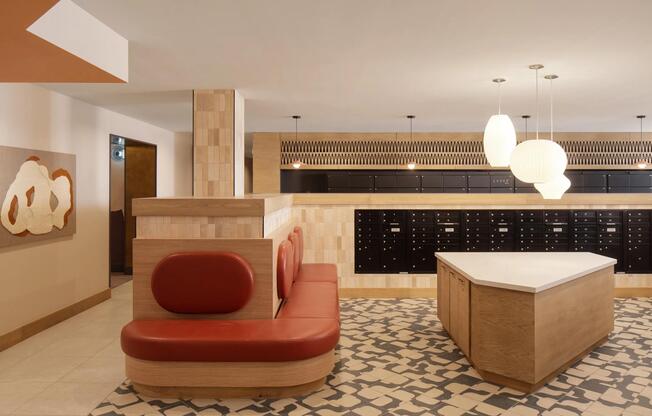 A thoughtfully designed mail lounge with warm finishes and modern lighting—every detail considered at Modera Rio Salado.