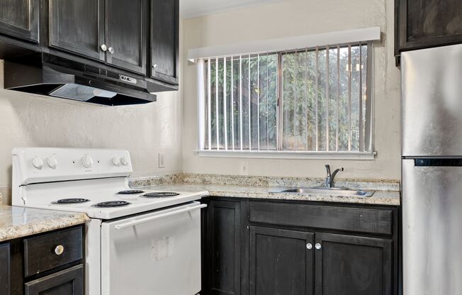 All Utilities Included in This Updated Oakland 2-Bed Apartment