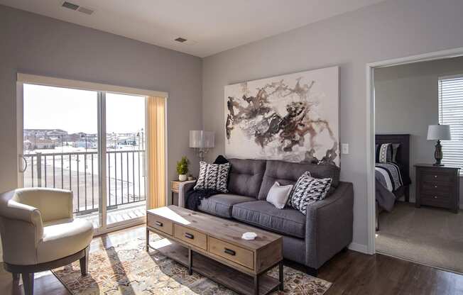 Living Room with Wood Style Flooring and Tall Ceilings