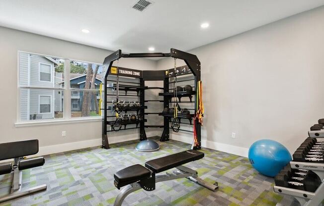 Resident gym with weightlifting equipment