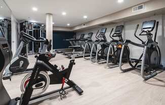Miracle Mile Los Angeles Apartments for Rent - The Preston Fitness Center with Ellipticals, Treadmills, Exercise Bikes, and More