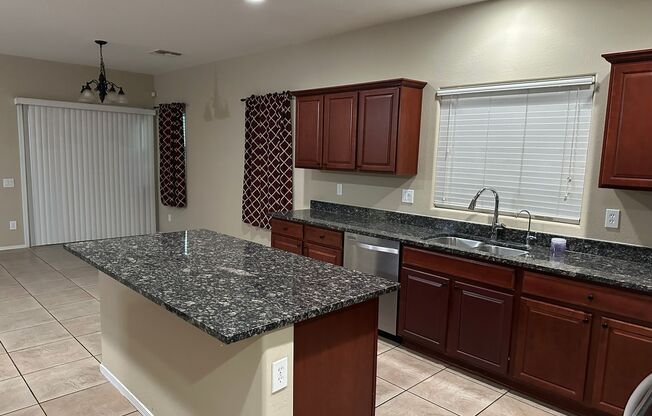 Charming 3 Bed + Den 2.5 Bath Home with 2 car attached EV garage with community pool !!