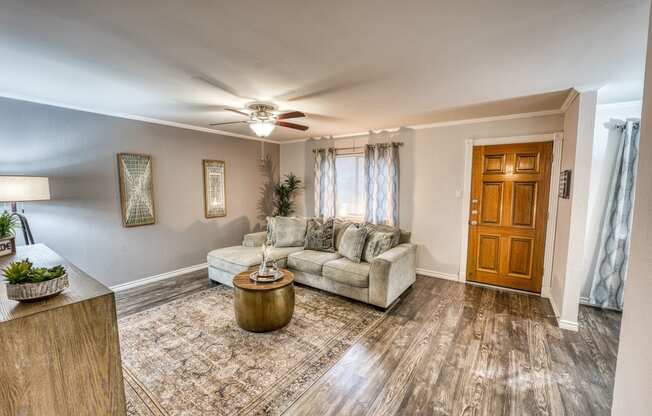 an empty room with a pot on the floor