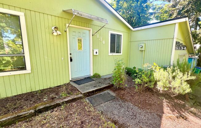 South Tabor Neighborhood Home with Spacious Fenced Backyard, Attached Garage