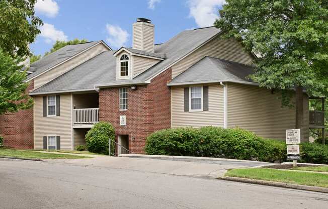 a large house with a street in front of it