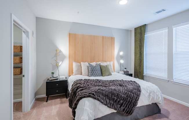 Large bedrooms with plush carpet and big windows at Bon Haven Apartments in Spartanburg, SC