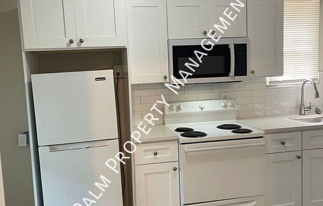 1323 E 55 ST