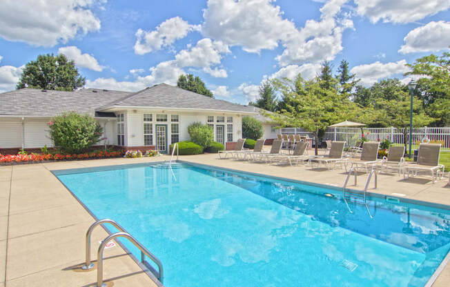 our apartments have a resort style pool with chairs
