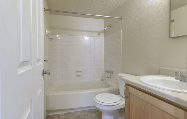 Master Bath with Shower/Tub at Old Monterey Apartments in Springfield, MO